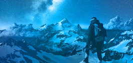 Mountaineer looking towards the horizon