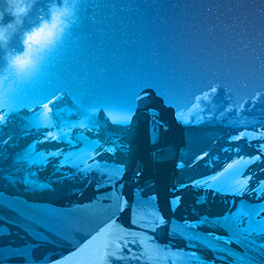 Mountaineer looking towards the horizon